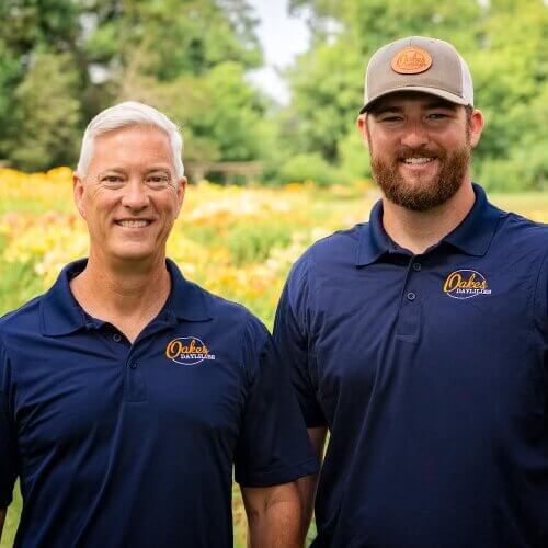 Ken and Josh Oakes in daylily field